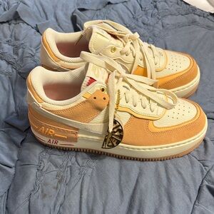 Nike Air Sneakers in Cream and Orange